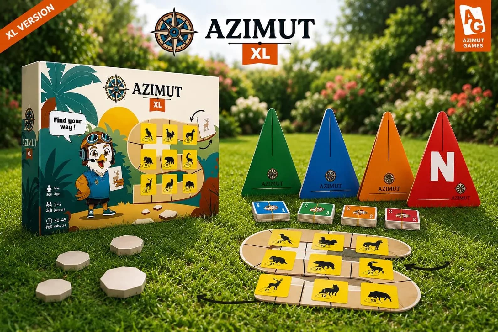 Azimut XL installé sur une pelouse : la boîte, les quatre triangles de direction, les paquets de cartes et la grille de balises animaux